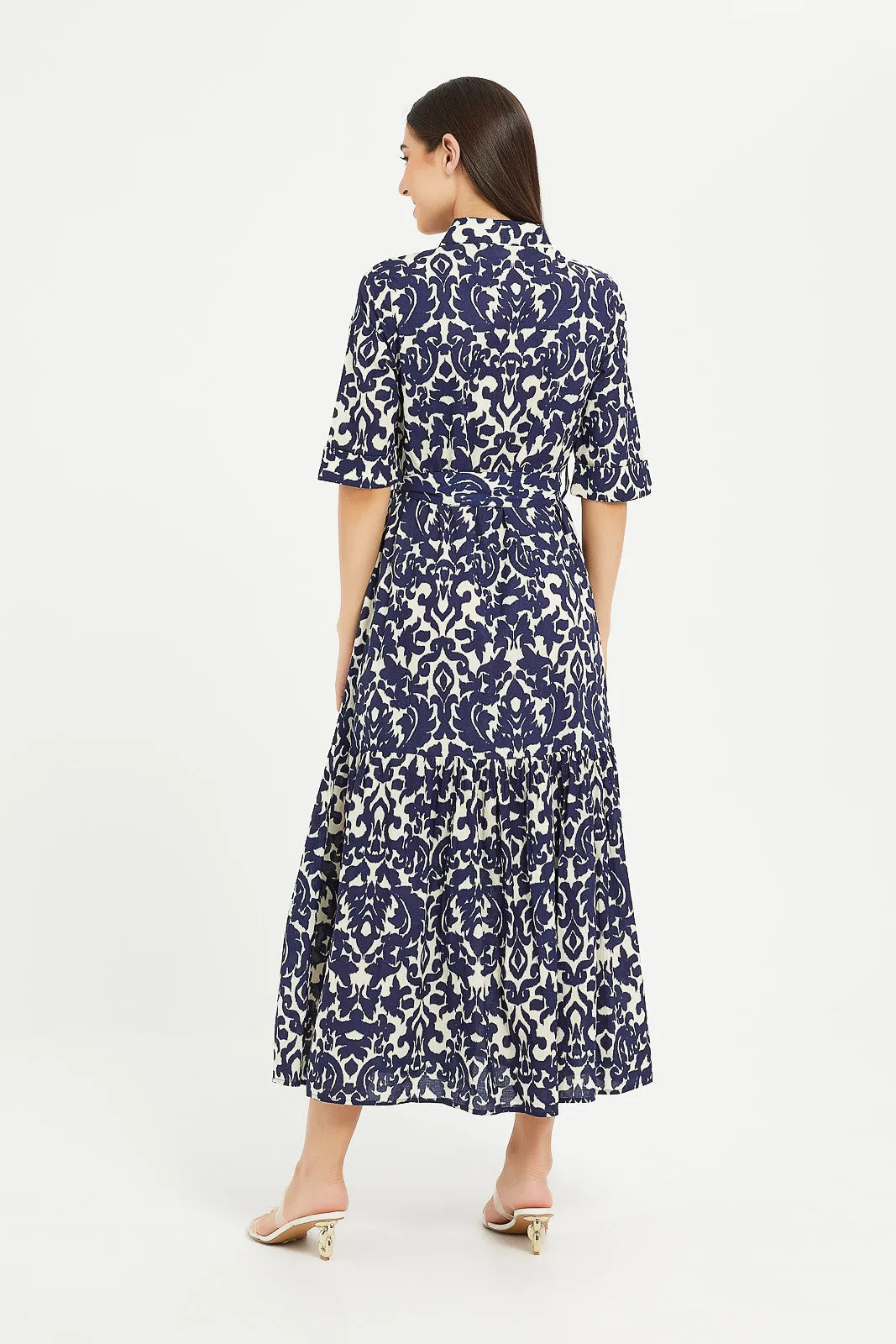 Women Cream And Navy Printed Teared Maxi Dress